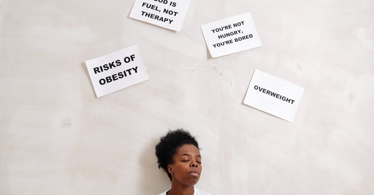 African American woman with health messages about nutrition and obesity awareness.